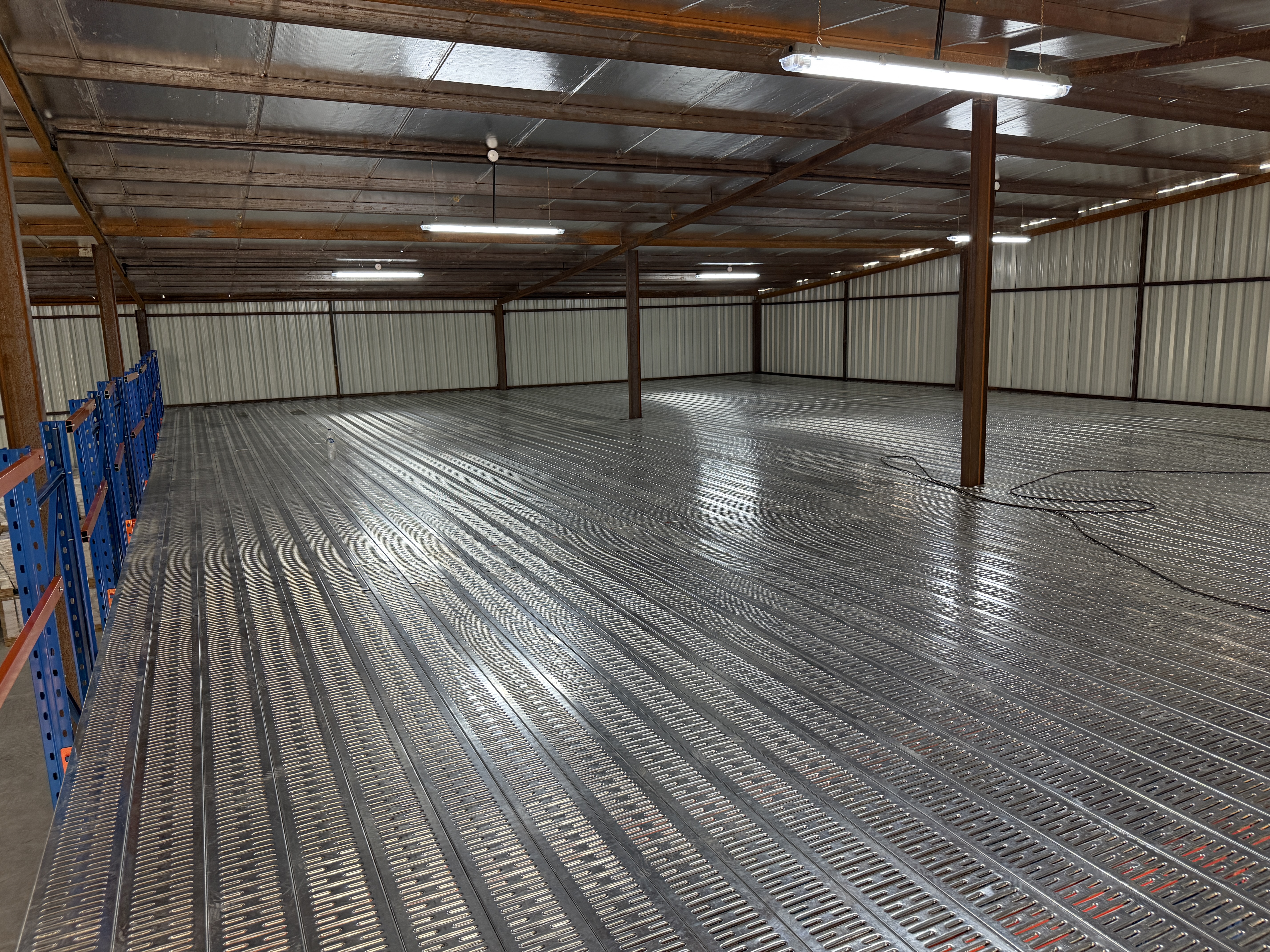 Custom steel mezzanine floor racking system installed in a 280 sqm warehouse in Ajman UAE-02