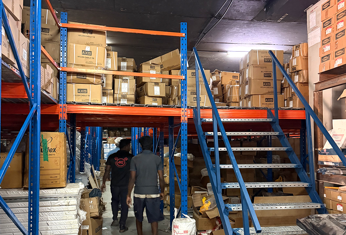 Heavy-duty rack-supported mezzanine floor system manufactured by GXM, compliant with Dubai Municipality standards.