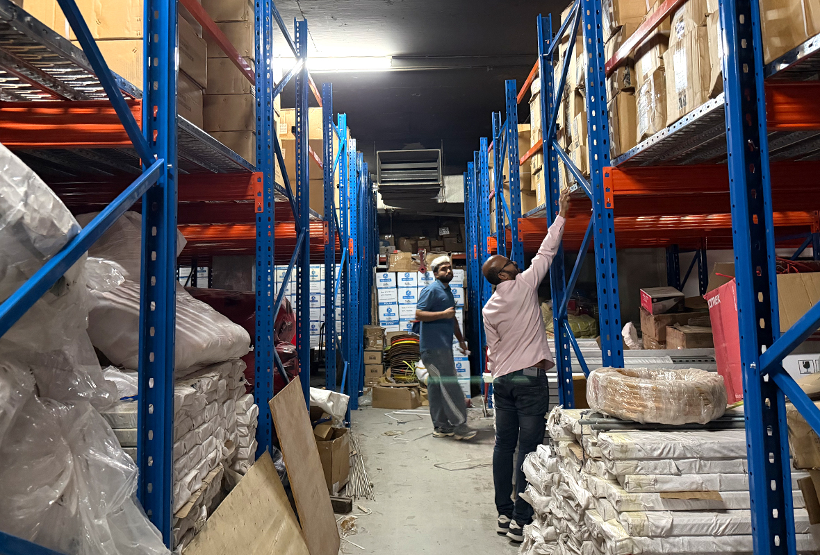 Heavy-duty rack-supported mezzanine floor system manufactured by GXM, compliant with Dubai Municipality standards.
